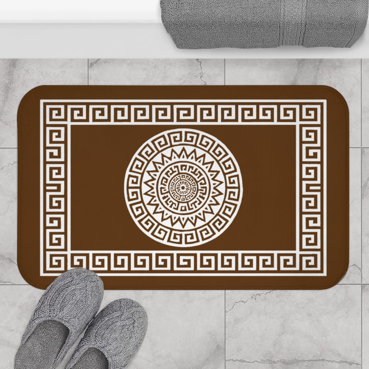 Geometric Bath Mat. A bath mat that is not just an accessory, but a true design statement. Its black-and-white graphic, inspired by the iconic geometric motifs of classical tradition, brings a touch of timeless luxury to the bathroom.