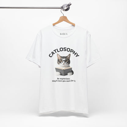Catlosophy Unisex Jersey Maglietta a maniche corte – Design "Sii misterioso"