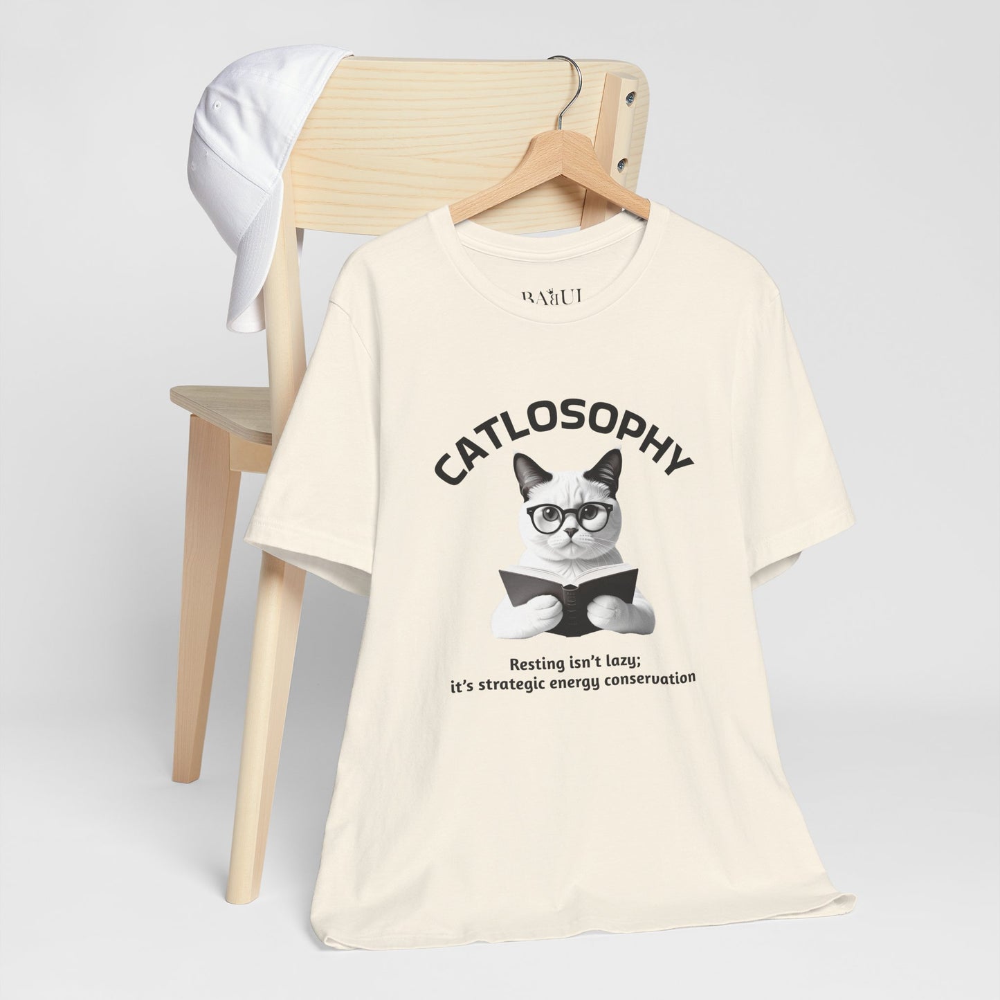 Catlosophy Unisex Jersey Maglietta a maniche corte – Design "Riposare non è pigrizia"
