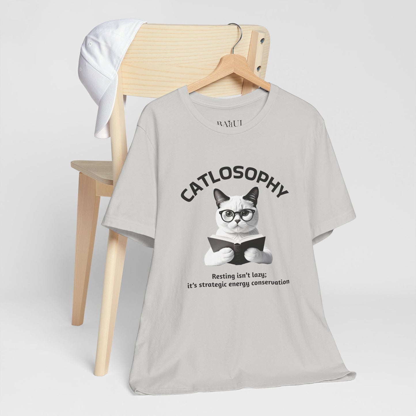 Catlosophy Unisex Jersey Maglietta a maniche corte – Design "Riposare non è pigrizia"