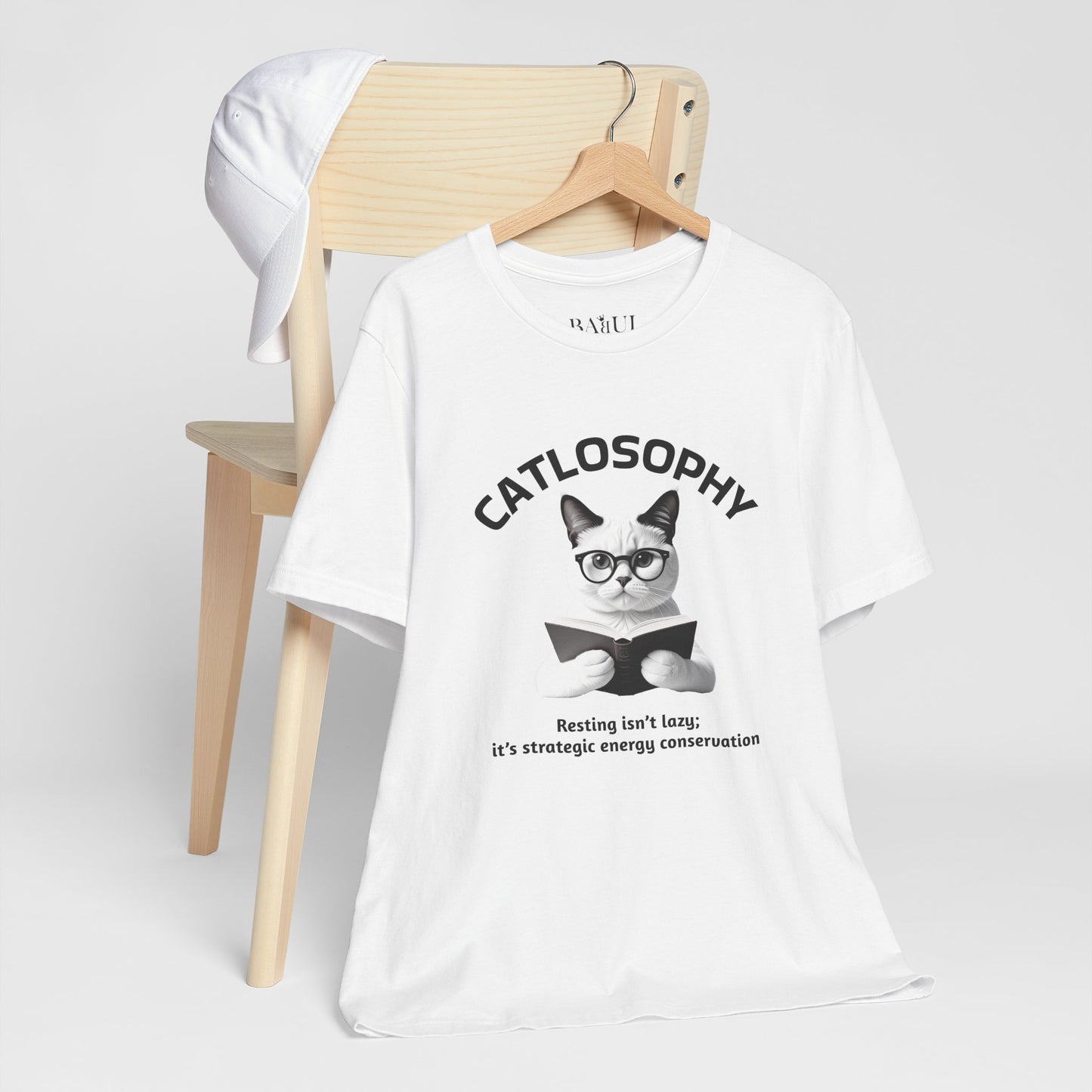 Catlosophy Unisex Jersey Maglietta a maniche corte – Design "Riposare non è pigrizia"