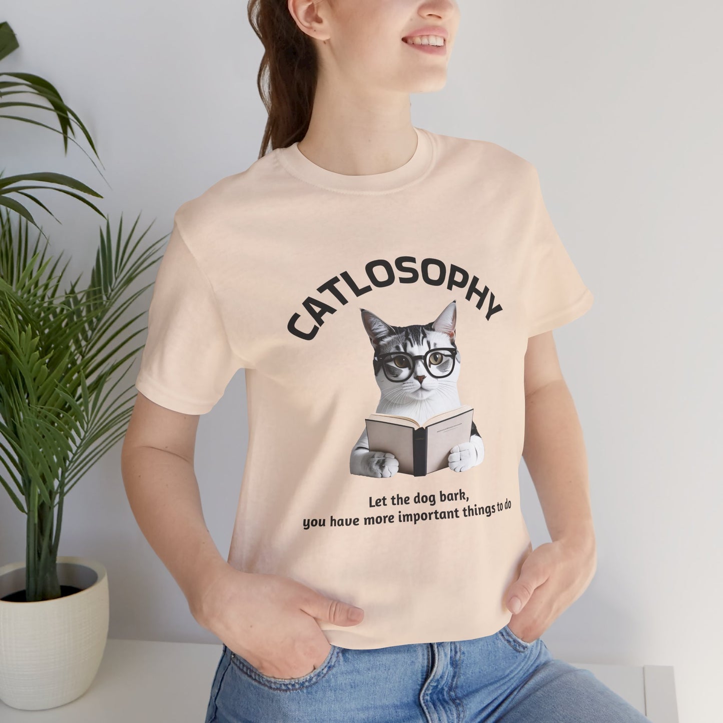 Maglietta a maniche corte unisex Catlosophy – Design "Lascia che il cane abbai"