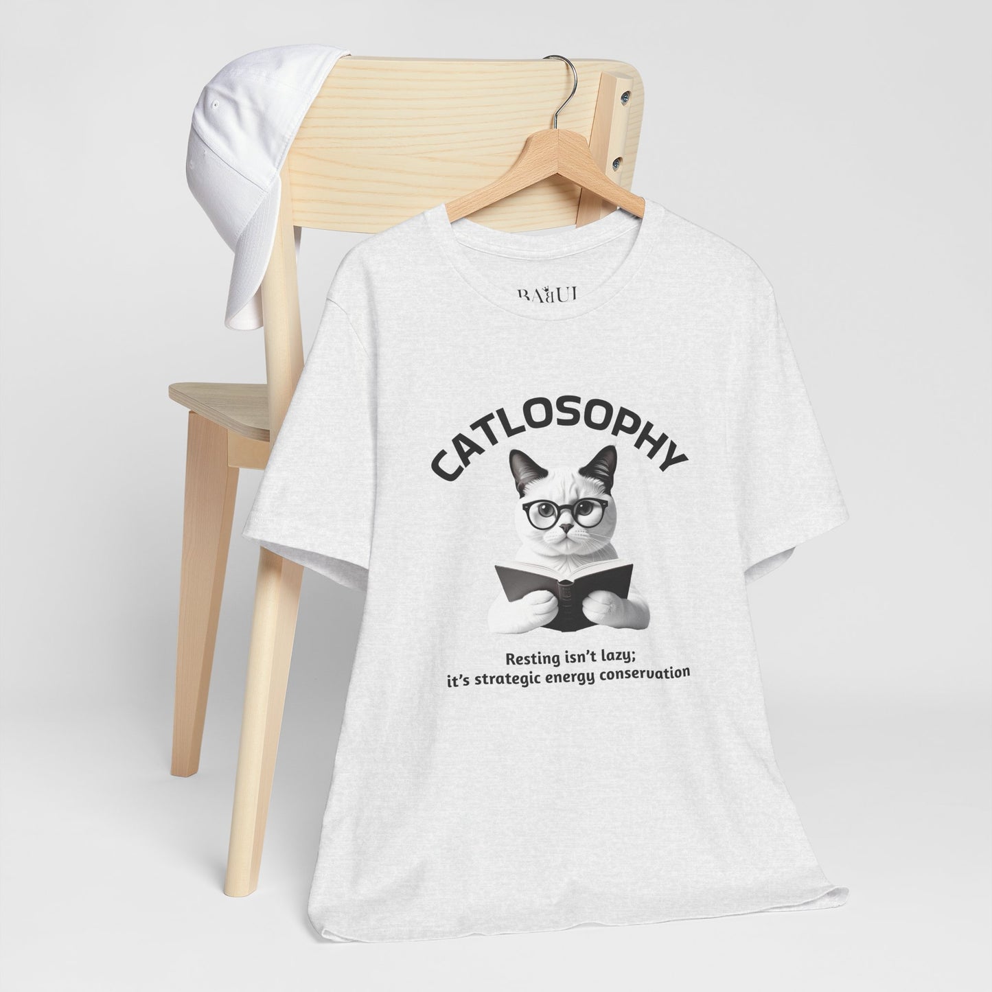 Catlosophy Unisex Jersey Maglietta a maniche corte – Design "Riposare non è pigrizia"